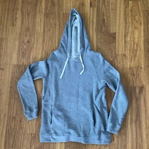 J Crew Factory gray hooded sweatshirt with front pockets.
